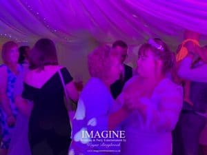 Nicola & Tom's evening wedding reception in a Marquee in the grounds of the Nyton Hotel in Ely