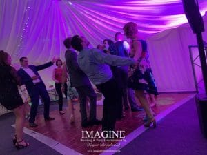 Nicola & Tom's evening wedding reception in a Marquee in the grounds of the Nyton Hotel in Ely