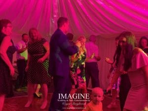 Nicola & Tom's evening wedding reception in a Marquee in the grounds of the Nyton Hotel in Ely