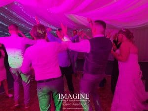 Nicola & Tom's evening wedding reception in a Marquee in the grounds of the Nyton Hotel in Ely