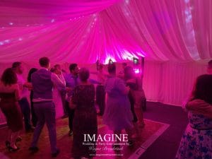 Nicola & Tom's evening wedding reception in a Marquee in the grounds of the Nyton Hotel in Ely