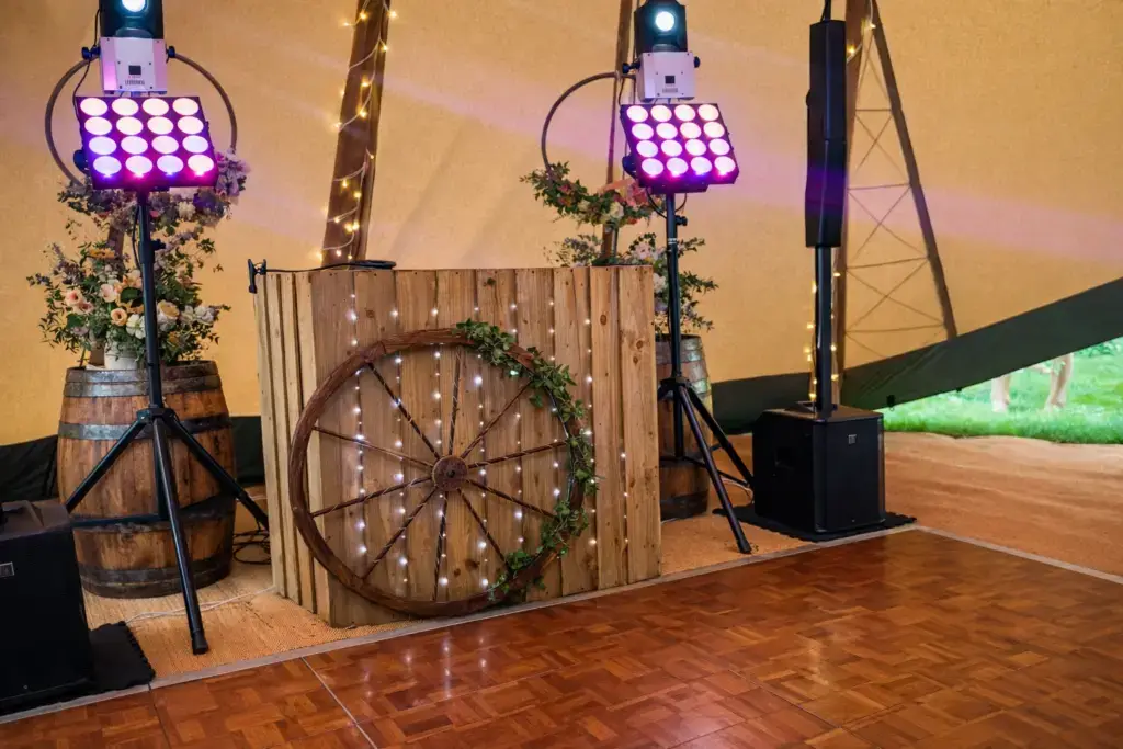 Rustic pallet booth setup in a tipi